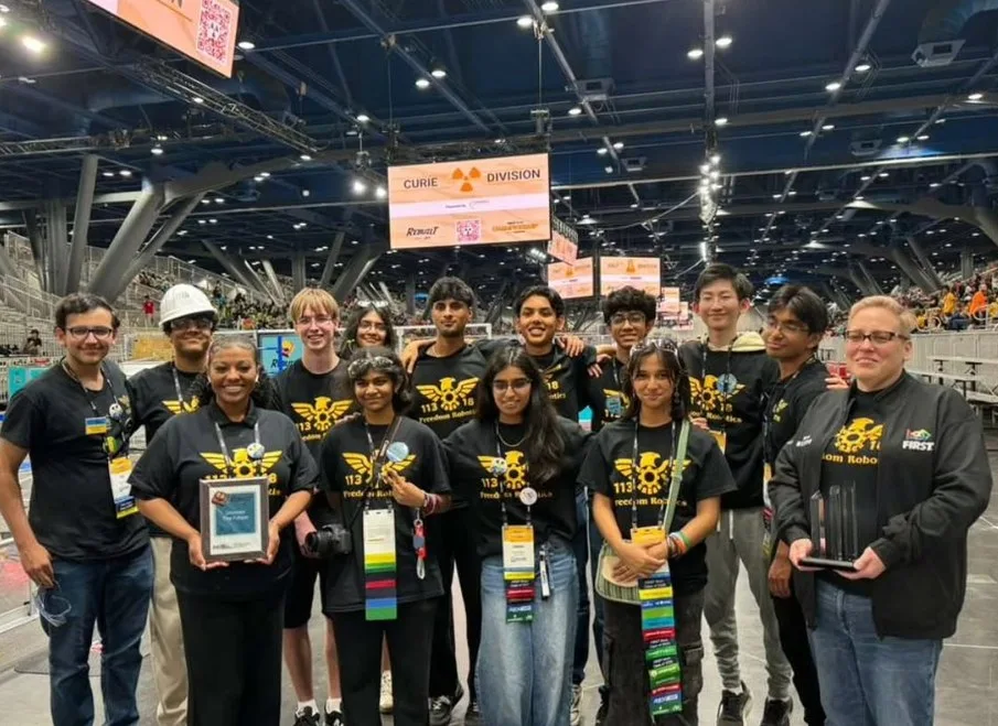 Freedom Robotics celebrating the Curie Division Rookie All-Star award